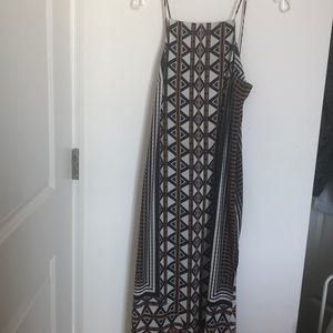 Dress with multiple patterns.